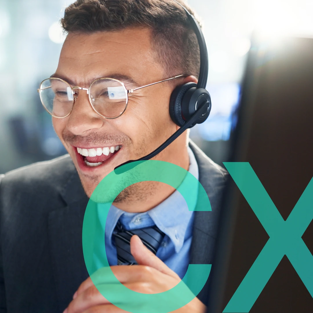 Smiling customer service agent wearing a headset.