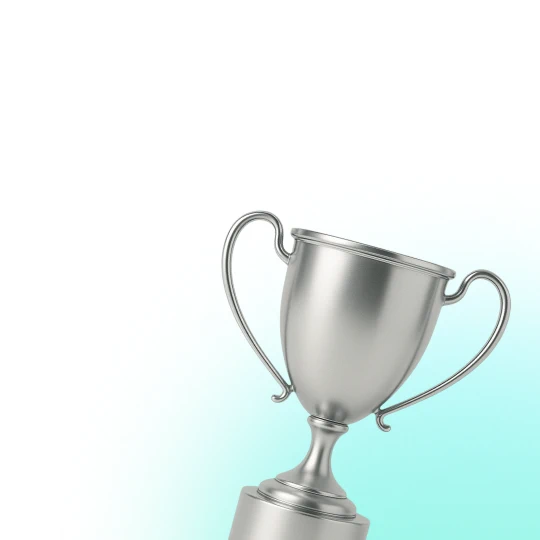 Gray trophy on a turquoise and white background.