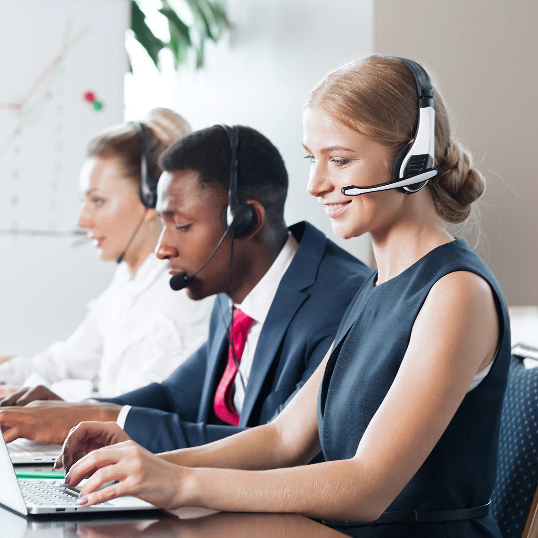 Smiling customer support agents providing support