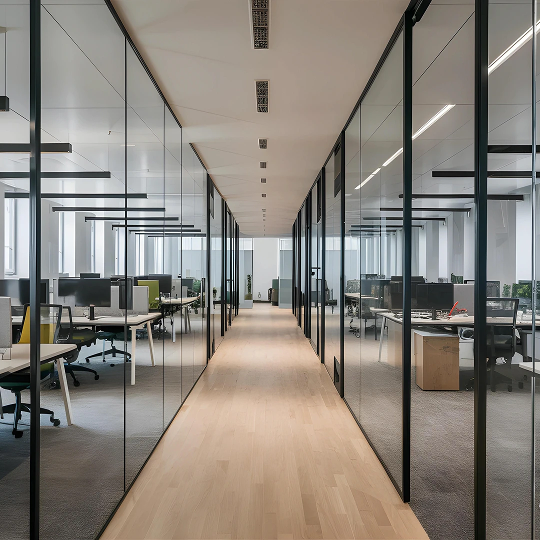 Modern office hallway with glass-walled offices