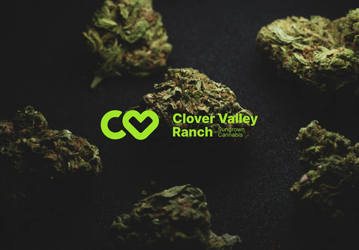 A few cannabis buds against the Clover Valley Ranch logo.
