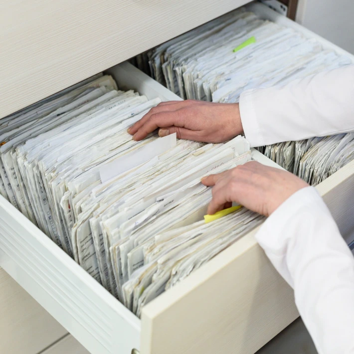 a medical worker looking for patient information