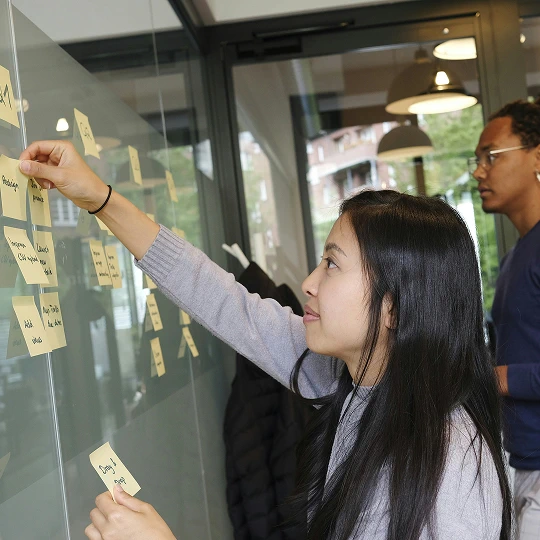 an asian girl planning something