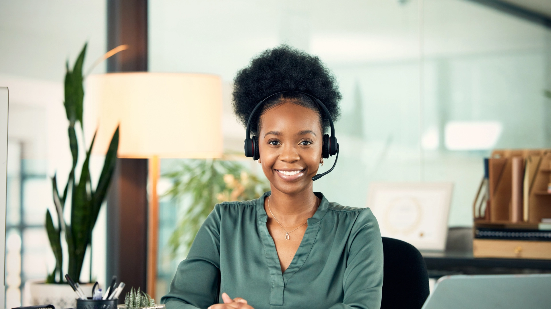 Friendly and professional customer support agent ready to assist.